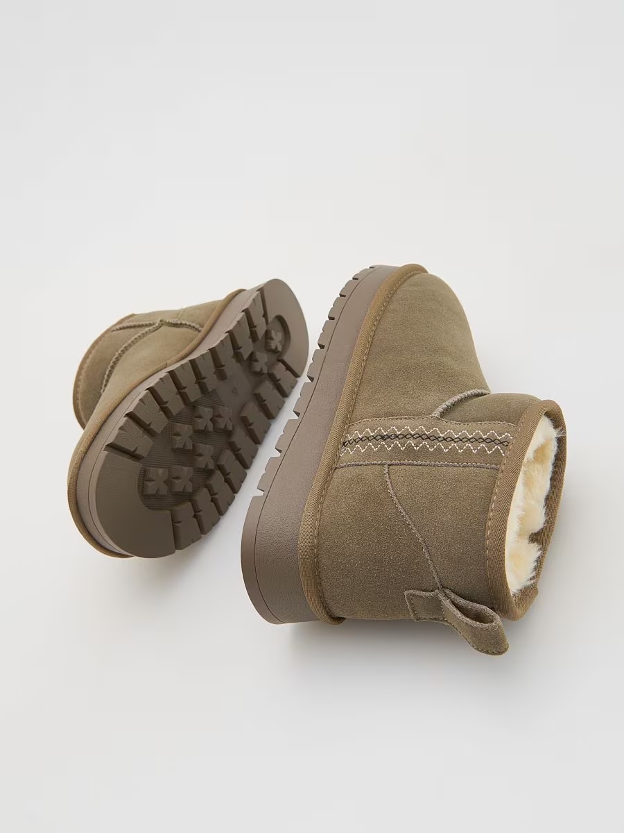 Одяг та взуття  Знижки до  42% из магазина RESERVED (Германия)